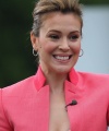 Alyssa-Milano-front-poof-with-bun-hairstyle.jpg